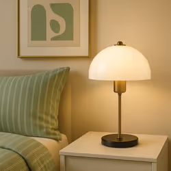 Lampada da tavolo a forma di fungo dorato 37cm Con il suo paralume dorato antico e la sua silhouette sinuosa, questa lampada  ...