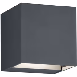 Design poliedrico e forma semplice: l'applique ADAJA con illuminazione up & down. Quando l'apparecchio è acceso, la luce vien ...
