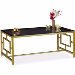 Questo elegante tavolino da divano è un vero e proprio elemento di arredo per il salotto: la superficie in vetro nero-traspar ...