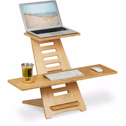 Trasforma in un batter d’occhio la tua scrivania in uno standing desk con questo supporto in bambù per monitor. Non solo rend ...