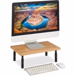 Questo supporto per monitor, realizzato in bambù naturale, mette ordine sulla tua scrivania. Il supporto per PC offre uno spa ...
