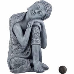 La statua rappresenta un Buddha in posizione di riposo, con la testa piegata e con la veste ornata di motivi decorativi - Tal ...