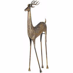 Moderna figura a forma di renna. Crea una atmosfera natalizia con decorazioni uniche. Questa statuetta di metallo è un access ...