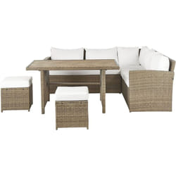 Set da giardino 5 posti in rattan sintetico marrone divano angolare tavolo 2 pouf cuscini bianchi Bardi