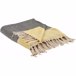 Plaid decorativo con frange. Completa il look del tuo divano o letto con tessili eleganti che renderanno l'intero ambiente ca ...