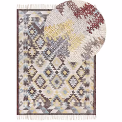 Tappeto in stile boho intrecciato a mano con nappe. Dona un tocco caldo e accogliente in salotto o in camera da letto con que ...