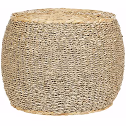Pouf rotondo intrecciato a mano. Questo pouf in seagrass lavorato a mano offre una seduta versatile e funge da elegante tavol ...