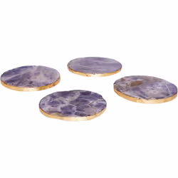Set di sottobicchieri in pietra con accenti dorati. Questo set di sottobicchieri non è solo decorativo ma anche funzionale. R ...