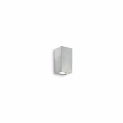 Corpo luce in vero cemento. Supporto di fissaggio in metallo non visibile. Emette luce sopra e sotto. L 10 x H 19 x P 10 cm m ...