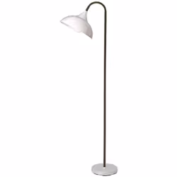 Collezione Swan LA LAMPADA CHE ILLUMINA CON GRAZIA Piantana realizzata in metallo e gomma nera presenta una struttura snella  ...