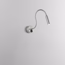 Collezione Minispy ELEGANZA FLESSIBILE Applique realizzata in metallo verniciato cromo, ha una forma lineare e minimalista ch ...
