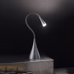 Collezione Snake LA LAMPADA CHE TI FA GIOCARE CON LA LUCE Lampada da tavolo realizzata con la struttura flessibibile in plast ...