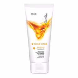Bionike Shine On Nutri Hair è un balsamo ad azione ristrutturante molto utile in caso di capelli colorati o danneggiati che f ...