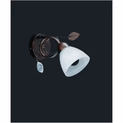 La lampada da parete TRADITIO di Trio Lighting è composta da una struttura in metallo finitura ruggine antico con coppa in ve ...