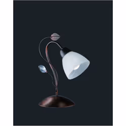 La lampada da tavolo TRADITIO di Trio Lighting è composta da una struttura in metallo finitura ruggine anticato con coppa in  ...