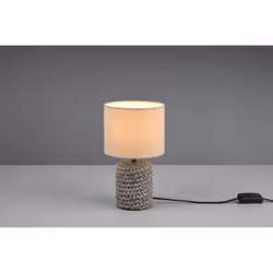 Il lumetto MALA di Trio Lighting è composto da una base in ceramica marrone dalla trama particolare che richiama l'idea di un ...