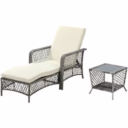 Descrizione: Il set da giardino Outsunny in rattan è composto da una sdraio da giardino con cuscino e un tavolino a due livel ...
