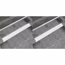 Questa canaletta di drenaggio per doccia ha un design moderno ed elegante, e aggiungerà un tocco di stile a qualsiasi bagno.  ...