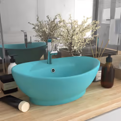 Il nostro lavabo di forma ovale, realizzato in ceramica di alta qualità, è un'aggiunta elegante a qualsiasi bagno, stanza dei ...