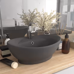 Il nostro lavabo di forma ovale, realizzato in ceramica di alta qualità, è un'aggiunta elegante a qualsiasi bagno, stanza dei ...