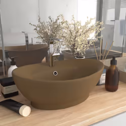 Il nostro lavabo di forma ovale, realizzato in ceramica di alta qualità, è un'aggiunta elegante a qualsiasi bagno, stanza dei ...
