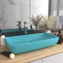 Questo lavabo rettangolare, realizzato in ceramica di alta qualità, è un'aggiunta elegante a qualsiasi bagno, guardaroba o to ...