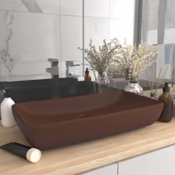 Questo lavabo rettangolare, realizzato in ceramica di alta qualità, è un'aggiunta elegante a qualsiasi bagno, guardaroba o to ...