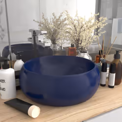 Il nostro lavabo di forma rotonda, realizzato in ceramica di alta qualità, è un'aggiunta elegante e senza tempo a qualsiasi b ...