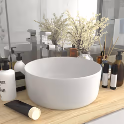 Il nostro lavabo rotondo, realizzato in ceramica di alta qualità, è un'aggiunta elegante perfetta per il vostro bagno, guarda ...