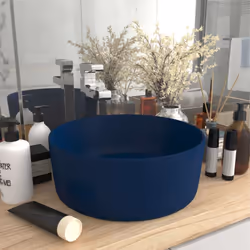 Il nostro lavabo rotondo, realizzato in ceramica di alta qualità, è un'aggiunta elegante perfetta per il vostro bagno, guarda ...