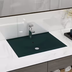 Il nostro lavabo rettangolare, realizzato in ceramica di alta qualità, è un'aggiunta elegante a qualsiasi bagno, guardaroba o ...