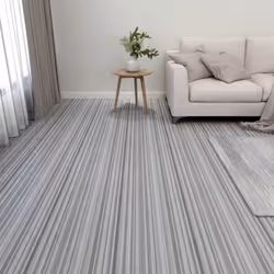 Il nostro set di listoni per pavimenti in PVC autoadesivo di alta qualità è composto da 20 listoni, ciascuno con una dimensio ...