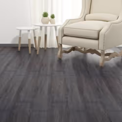 Questo set di listoni autoadesivi per pavimenti, consistente in 18 assi, somiglia a un vero parquet grazie ai motivi e le tex ...
