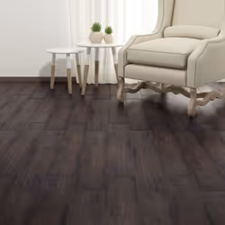 Questo set di listoni autoadesivi per pavimenti, consistente in 18 assi, somiglia a un vero parquet grazie ai motivi e le tex ...