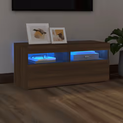 Caratterizzato da un design pratico ed elegante, questo mobile porta TV con luci a LED è destinato a diventare il punto focal ...