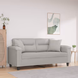 Questo divano a 2 posti, che si distingue per il suo design moderno e i cuscini decorativi, sarà il luogo ideale per chiacchi ...
